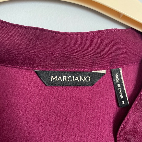 Dress in a burgundy color , soft material and perfect for parties. - Picture 2 of 5
